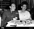 ROSALIND RUSSELL and her husband, Fred Brisson, at the Mocambo, 1944 ...