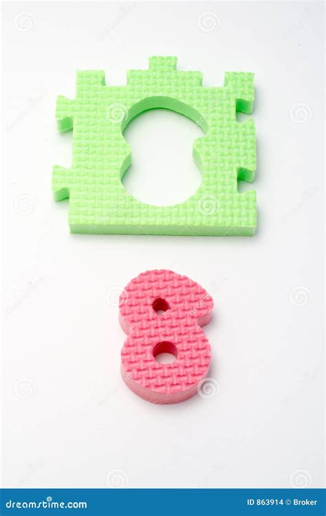 Number Eight Puzzle Mats Focus On The Front Small Dof Stock Images