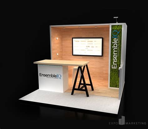 This Custom 10x10 Trade Show Booth Includes Puck Lighting Faux Green