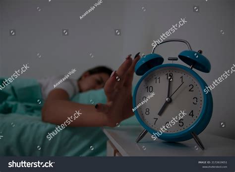 Waking Asleep Girl Stopping Alarm Clock Stock Photo 2172619051
