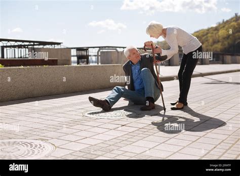 Weak Man Falling Down On The Street Stock Photo Alamy