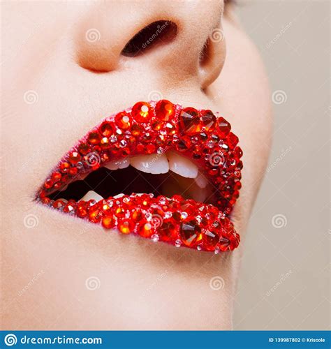Red Lips Covered With Rhinestones Beautiful Woman With Red Lipstick On