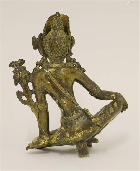 a-nepalese-bodhisattva,-wearing-an-elaborate-headdress,-seated-with-his