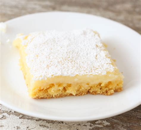 Kentucky butter cake is a rich, buttery, crazy moist vanilla poke cake infused with luscious butter sauce that soaks through the cake and is smothered on the cake leaving an irresistible sugar crust on the outside. Gooey Butter Cake - The Farmwife Cooks