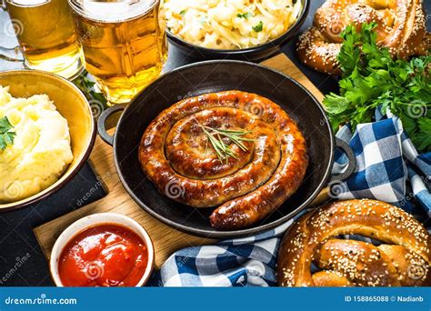 Oktoberfest Food Sausage Sauerkraut Beer And Bretzel Stock Photo