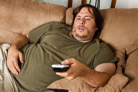 Fat Lazy Guy On The Couch Stock Photo Adobe Stock