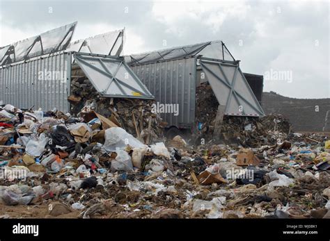 Trucks Dumping Waste At Landfill Site Stock Photo Alamy