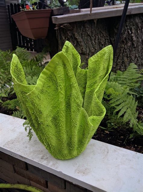 2, put the mixed concrete in the large containers, and then put the smaller containers in central,drill hole as the drainage holes in the bottom.stay. Cement /cloth flower pot holder or planter 16"high ...