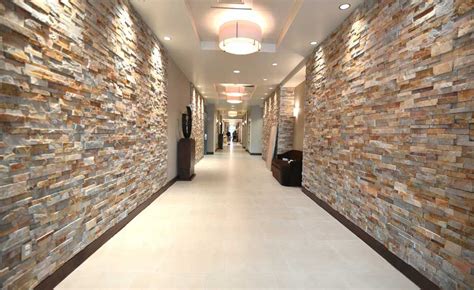 Gold Stacked Stacked Stone Walls In Hallway Of Hotel Stone Walls