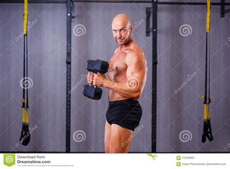 Strong Ripped Bald Man Pumping Iron Sports Man Working Out With Stock