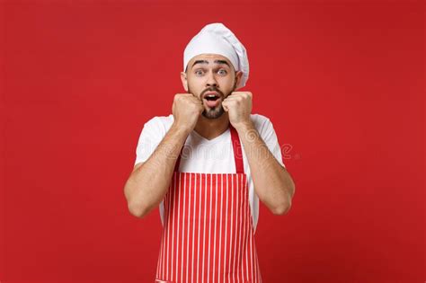 Shocked Young Bearded Male Chef Cook Or Baker Man In Striped Apron White T Shirt Toque Chefs Hat