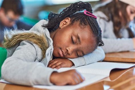 Sleeping Beauty In Class An Elementary School Girl Taking A Nap In The