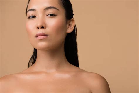 Beautiful Naked Asian Girl Looking Away Isolated Beige Stock Photo By Vitalikradko