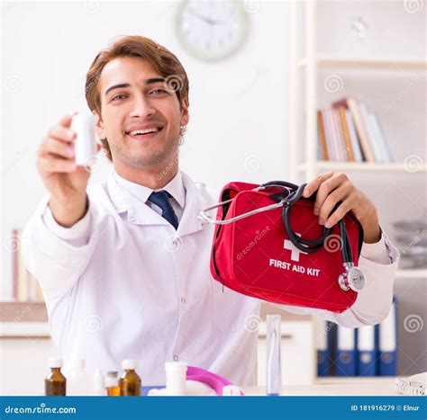 Young Doctor With First Aid Kit In Hospital Stock Image Image Of