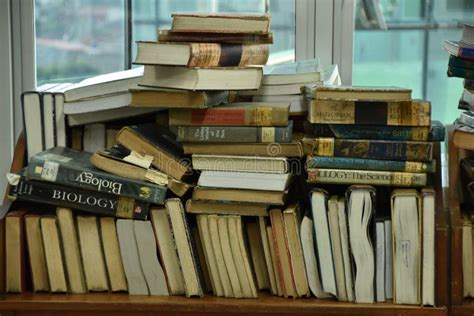 A Pile Of Books In The Library Editorial Photography Image Of Pile