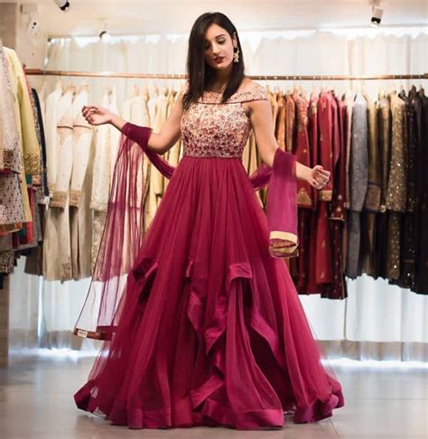 Wear a ball gown that has a bounce to it, so evening party wear long gowns are usually simple yet elegant. Pink Partywear Anarkali Gown - B4U Fashion
