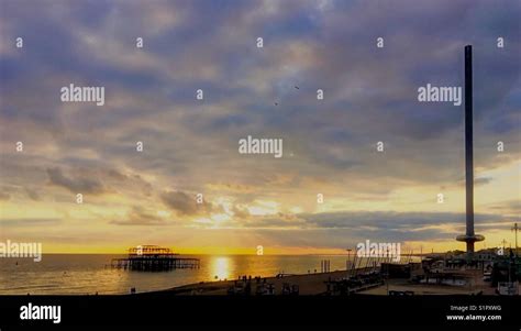 Sunset On Brighton Beach Stock Photo Alamy