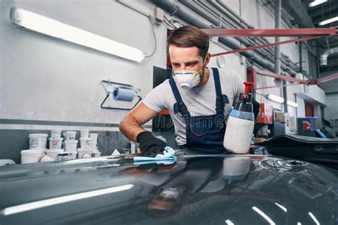 Car Repairman Wiping Car Surface With Cloth Stock Image Image Of