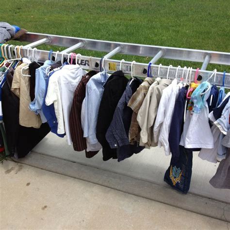 Going to yard sales vs. Great idea for displaying clothes at a garage sale! Turn a ...