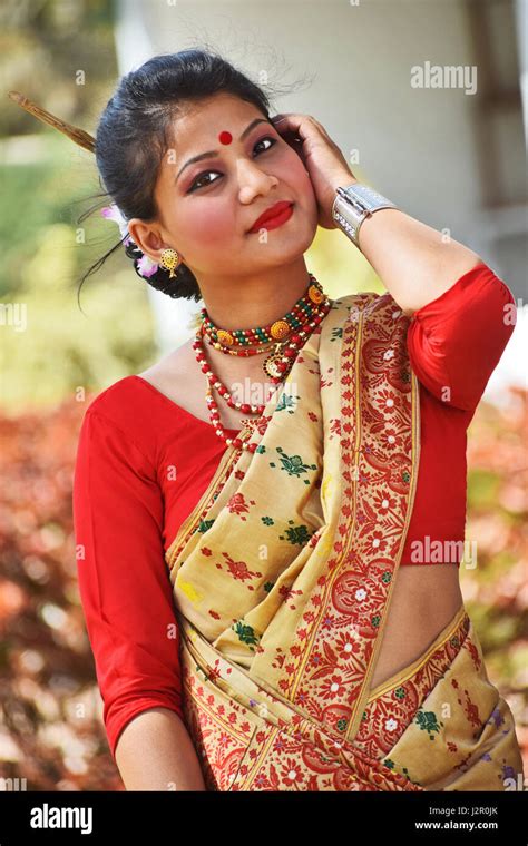 Assamese Girl In Traditional Attire Posing With A Dhol Pune Stock