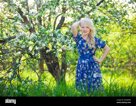 Adorable Kid Playing In Nature Cute Little Child Blonde Toddler Girl