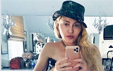 Madonna Leans On A Crutch As She Poses Topless For A Sizzling Selfie