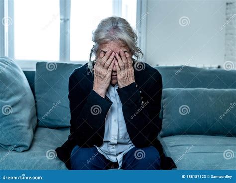 Senior Widow Woman Lonely And Sad Feeling Depressed At Home Stock Image