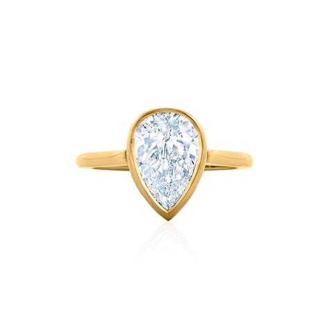 Pear Shape Diamond Engagement Ring In A Bezel Setting In 18k Yellow