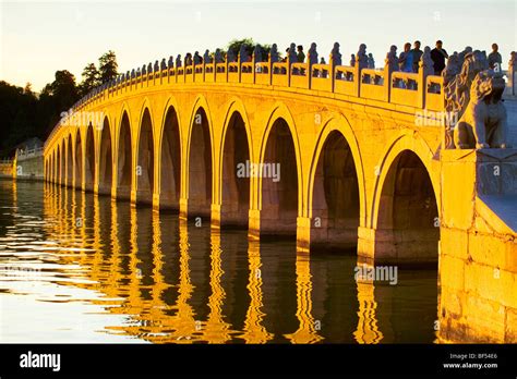 Seventeen Arch Bridge In Sunset Summer Palace Beijing China Stock