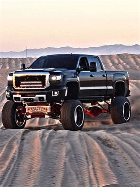 tearin it up in the sand custom lifted trucks mud trucks lifted chevy