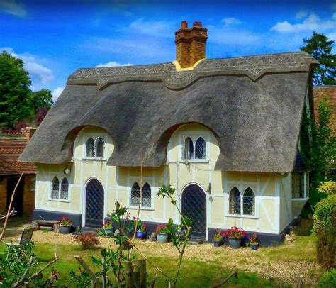 Pin By Rebecca Chargin On Country Cottagesthatched Roof Homes