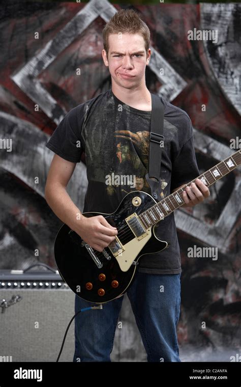Teen Boy Playing Guitar Stock Photo Alamy