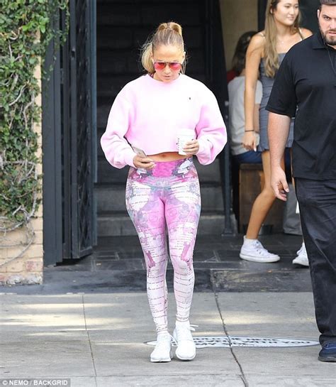 Jennifer Lopez Bares Her Toned Tummy In Pink Cut Off Sweatshirt And