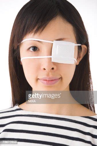 A Woman Wearing Eye Patch High Res Stock Photo Getty Images