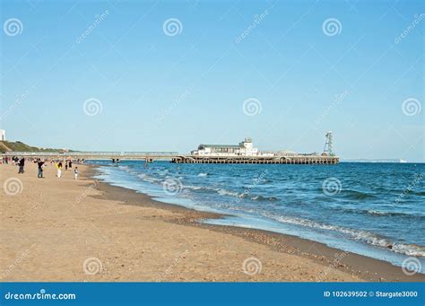 Ocean And Bournemouth Pier On Bournemouth Beach Editorial Photography