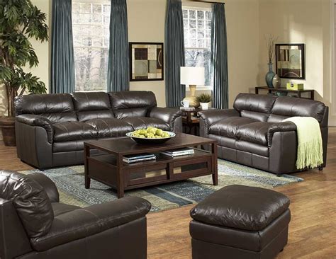 I think leather is having a come back (especially streamlined beauties like our new leather sectional at the ranch), but big brown beasts can be tricky to decorate either way. Dark Brown Full Leather Transitional Style Sofa & Loveseat Set