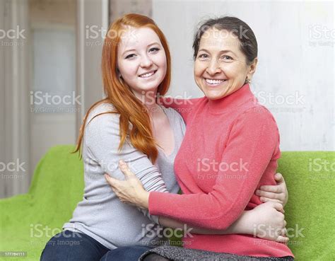 Happy Mother And Daughter Hugging Each Other Stock Photo Download