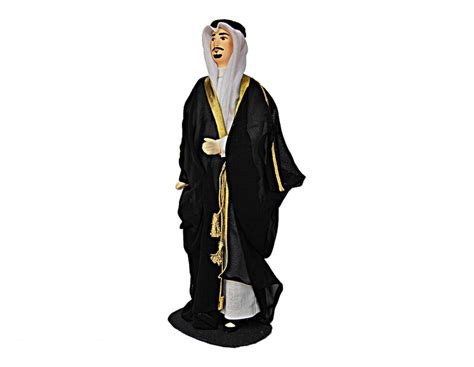 saudi arabesque porcelain souvenir doll in traditional formal male saudi arabian attire saudi