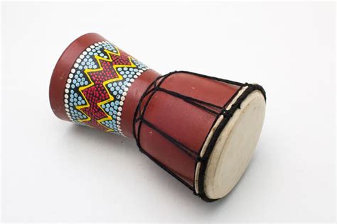 Foto Alat Musik Tradisional Tifa Dari Papua Cara Memainkan Fungsi