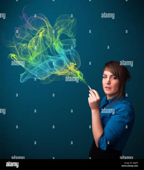 Pretty Lady Smoking Cigarette With Colorful Smoke Stock Photo Alamy