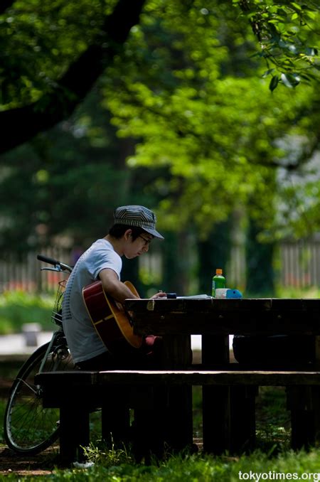 japanese man singing in the park — tokyo times