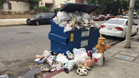 Trash Spills Out Onto Panorama City Street Amid Recycling Program