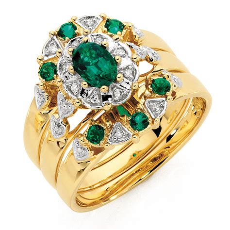 Ring With Created Emerald And Diamonds In 10kt Yellow Gold