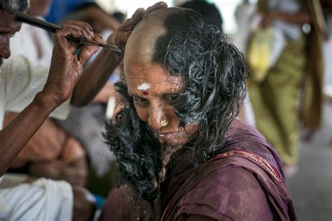 these stunning images show indian women shaving their heads for religion mogul