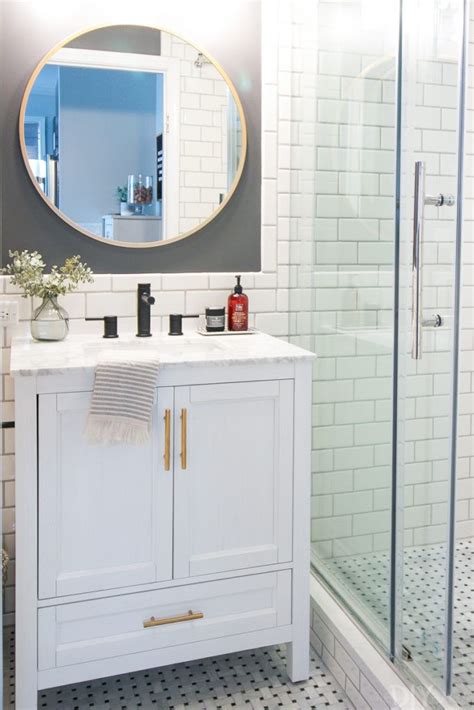 Instead of attempting to tile sloping walls, simply stop part way up and paint the rest white. Stunning Tile Ideas for Small Bathrooms