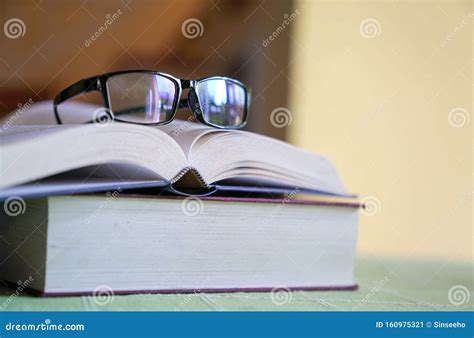 Reading Glasses On Stacked Of Books Education Concept Stock Image Image Of Long Space 160975321