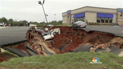 Giant Sinkhole Swallows Over Dozen Cars At Mississippi International