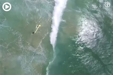 Watch A Drone Rescue Two Drowning Swimmers Sysyphoto