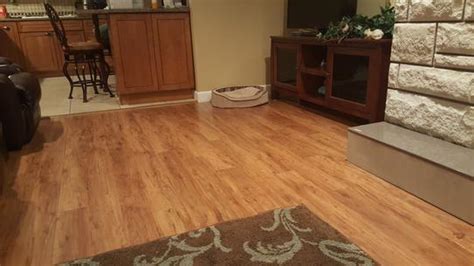 The color comes across as a nice dark brown with a slight reddish tint. Pergo Outlast+ Applewood 10 mm Thick x 5-1/4 in. Wide x 47-1/4 in. Length Laminate Flooring (13 ...