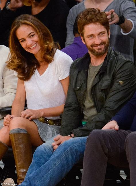 totally smitten gerard butler dresses down in denim as he enjoys yet another date with mystery